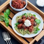 This twist on traditional spaghetti and meatballs is fresh and flavoursome. Make the pasta and sauce while the lamb meatballs are baking and you can have dinner on the table in around half an hour. Easy!