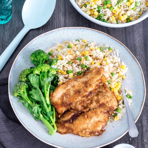 This recipe transforms plain chicken breasts into something quite delicious! Honey soy chicken on rice is an easy recipe that the whole family will enjoy.