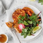 Thai prawn fritters with salad, fresh herbs, pickled radish and lime.