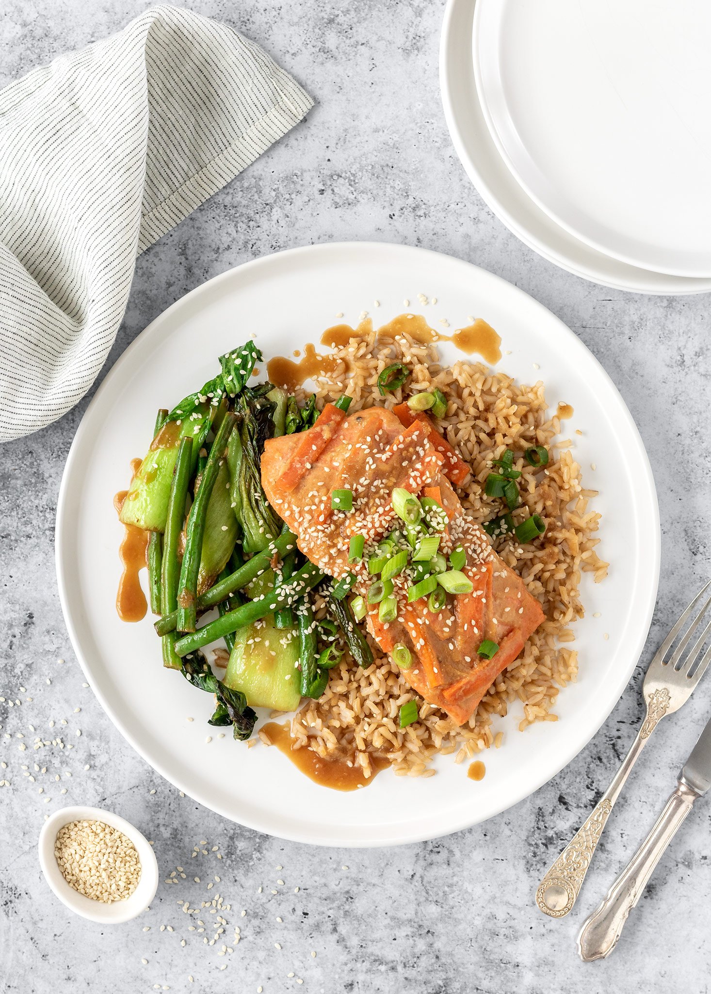 Miso ginger salmon with garlicky greens, brown rice and sesame seeds.